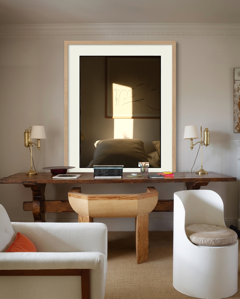 Linen Morning interior print in a black frame in a calm living room