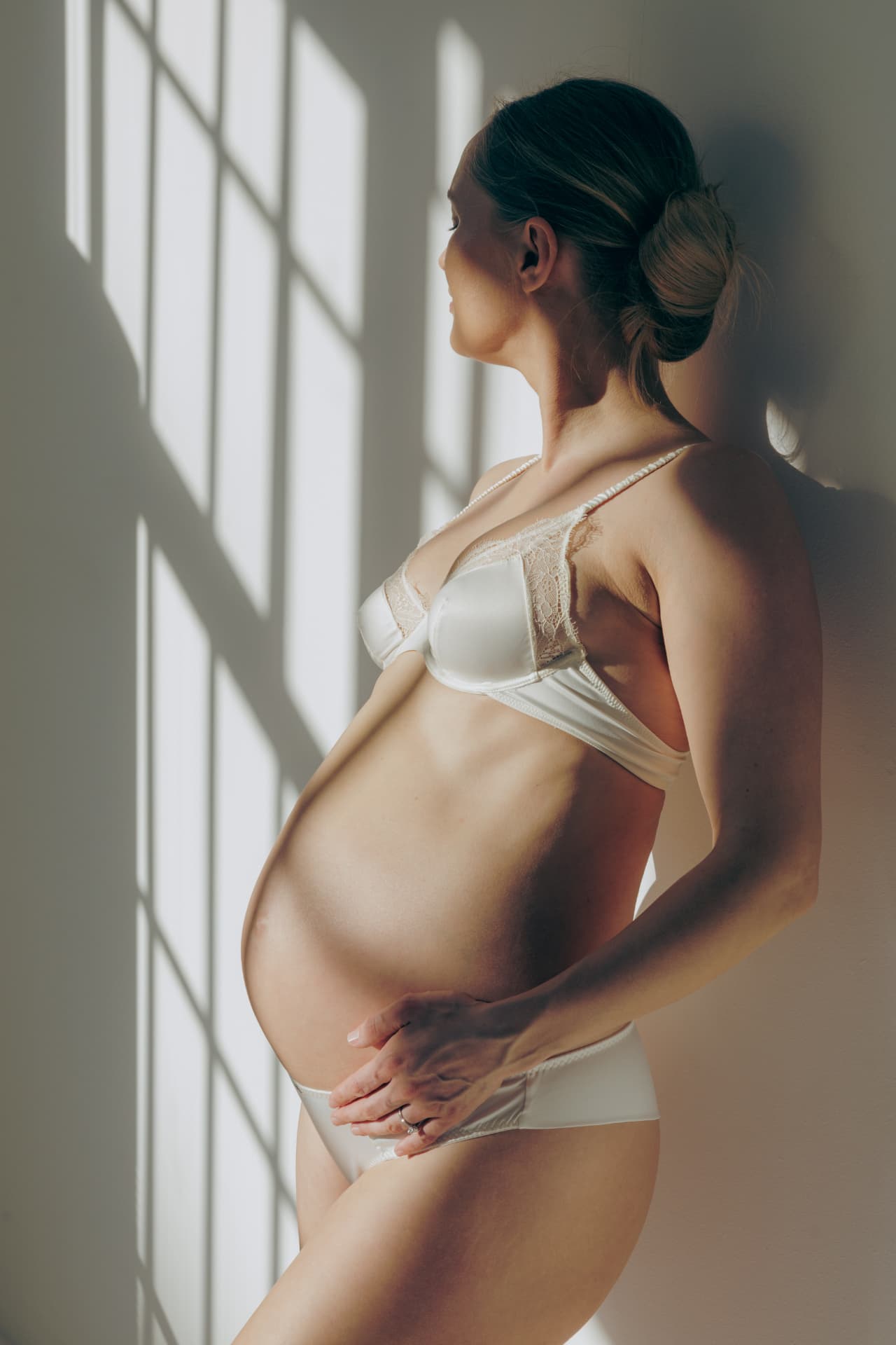 Maternity portrait in soft window light